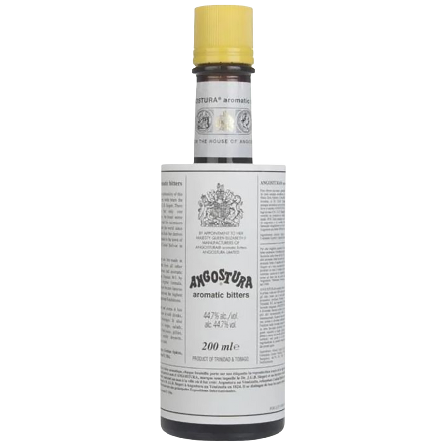 A bottle of Angostura aromatic bitters with a white label and a yellow cap, shown against a plain white background.