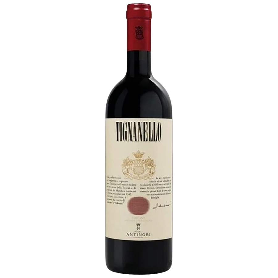 Bottle of Tignanello wine with a red cap on a white background