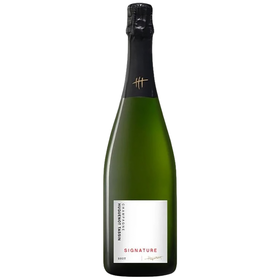 A bottle of Champagne Huguenot Tassin Signature Blanc de Noirs
